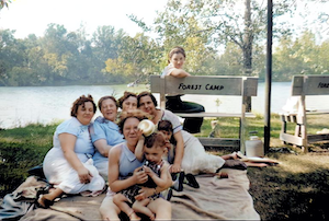 Freda Dumes, Anna Schultz, Becky Dumes, Lillian Dumes Zoll, Aunt Minnie, unknown, Sol Francis Karp.  Evelyn Dumes (Sol's wife) is sitting on the bench.